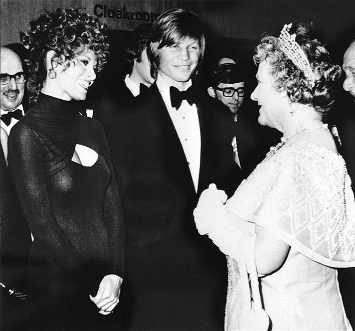 1974 Raquel Welch & Michael York meeting the  British Queen mother.