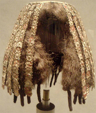 Mannequin head with example of favored wig style during the Egyptian Middle Kingdom
