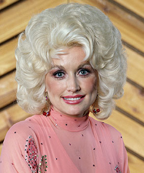 Dolly Parton wearing a wig