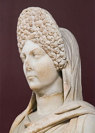 Roman statue of a woman with elaborate hairstyle